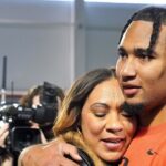 Ohio State quarterback C.J. Stroud hugs his mother, Kim, after his workout on the Buckeyes' pro day.