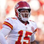 Kansas City Chiefs quarterback Patrick Mahomes (15) reacts after the Chiefs scored a touchdown against the San Francisco 49ers in the fourth quarter at Levi's Stadium.