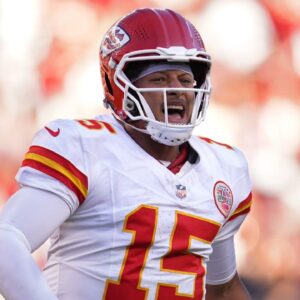Kansas City Chiefs quarterback Patrick Mahomes (15) reacts after the Chiefs scored a touchdown against the San Francisco 49ers in the fourth quarter at Levi's Stadium.