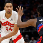 Toronto Raptors center Jontay Porter (34) is defended by Detroit Pistons center James Wiseman (13) in the second half at Little Caesars Arena.