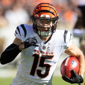 Cincinnati Bengals wide receiver Charlie Jones (15) returns the opening kickoff for a touchdown against the Cleveland Browns during the first quarter at Huntington Bank Field.