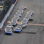 NASCAR Cup Series driver Kyle Larson (5) and NASCAR Cup Series driver Bubba Wallace (23) lead the field to restart the Cook Out Southern 500 at Darlington Raceway.