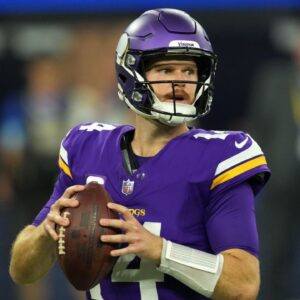 Minnesota Vikings quarterback Sam Darnold (14) throws the ball against the Los Angeles Rams in the first half at SoFi Stadium.
