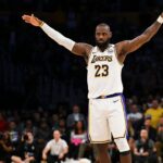 Los Angeles Lakers forward LeBron James (23) reacts against the Sacramento Kings during the second half at Crypto.com Arena.