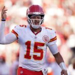 Kansas City Chiefs quarterback Patrick Mahomes (15) reacts after the Chiefs scored a touchdown against the San Francisco 49ers in the fourth quarter at Levi's Stadium.