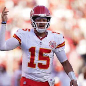 Kansas City Chiefs quarterback Patrick Mahomes (15) reacts after the Chiefs scored a touchdown against the San Francisco 49ers in the fourth quarter at Levi's Stadium.