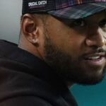 Miami Dolphins quarterback Tua Tagovailoa stands on the sidelines during the second half against the Tennessee Titans at Hard Rock Stadium.