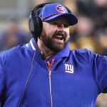 Oct 28, 2024; Pittsburgh, Pennsylvania, USA; New York Giants head coach Brian Daboll (left) reacts to down judge Brian Sakowski (112) against the Pittsburgh Steelers during the second quarter at Acrisure Stadium.