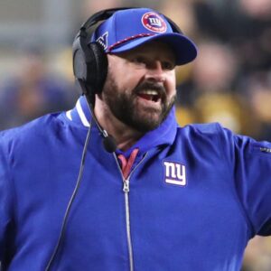 Oct 28, 2024; Pittsburgh, Pennsylvania, USA; New York Giants head coach Brian Daboll (left) reacts to down judge Brian Sakowski (112) against the Pittsburgh Steelers during the second quarter at Acrisure Stadium.