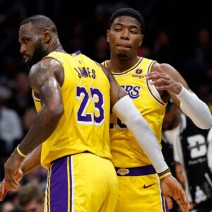 Apr 3, 2024; Washington, District of Columbia, USA; Los Angeles Lakers forward LeBron James (23) talks with Lakers forward Rui Hachimura (28) against the Washington Wizards at Capital One Arena. Mandatory Credit: Geoff Burke-Imagn Images