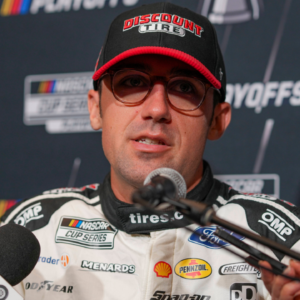 Austin Cindric speaks to media members during the NASCAR Playoffs Media Day at the Charlotte Convention Center.