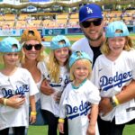 Los Angeles Rams quarterback Matthew Stafford (9) with his wife Kelly with their 4 daughters on the field prior to the game between the Los Angeles Dodgers and the Atlanta Braves at Dodger Stadium. Stafford was at the game on Rams day.