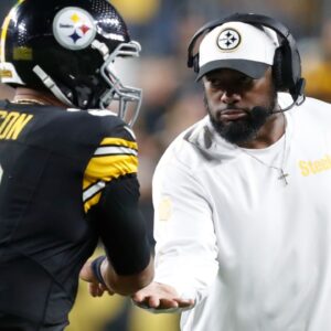 Oct 20, 2024; Pittsburgh, Pennsylvania, USA; Pittsburgh Steelers head coach Mike Tomlin (right) congratulates quarterback Russell Wilson (3) on his touchdown pass against the New York Jets during the second quarter at Acrisure Stadium.