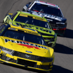Cup Series driver Joey Logano (22) leads driver William Byron (24) and driver Chris Buescher (17) during the South Point 400 at Las Vegas Motor Speedway.