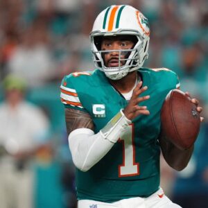 Miami Dolphins quarterback Tua Tagovailoa (1) drops back with the ball against the Buffalo Bills during the first half at Hard Rock Stadium.