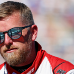 Xfinity Series driver Justin Allgaier (7) looks on before the Drive for the Cure 250 at Charlotte Motor Speedway Road Course.