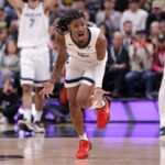 Memphis Grizzlies guard Ja Morant (12) reacts to being called for a foul during the second half against the Utah Jazz at Delta Center.