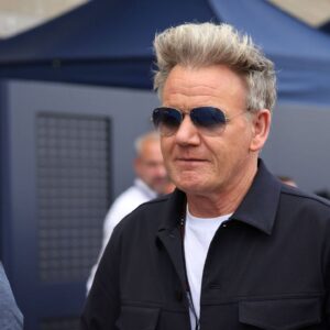 Gordon Ramsay GBR Gastronomer and Kock walks through the paddock