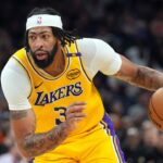 Los Angeles Lakers forward Anthony Davis (3) dribbles against the Phoenix Suns during the second half at Footprint Center