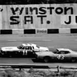 Cale Yarborough (11) battles Richard Petty (43) during the Winston Cup Music City USA 420 in the NASCAR Grand National race at Nashville Speedways May 12, 1974. But Petty went on to win his eighth NASCAR victory in Nashville. Title 1974 Auto Racing In Nashville
