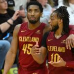 Cleveland Cavaliers guard Donovan Mitchell (45) and guard Darius Garland (10) talk in the fourth quarter against the Indiana Pacers at Rocket Mortgage FieldHouse.