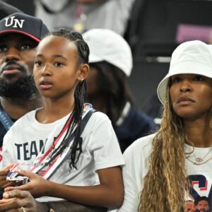 Paris 2024 - LeBron James At Women s Basketball Final Bam Adebayo, LeBron James and his daughter Zhuri James , and Savannah James at the Women s Gold Medal game between France and USA during Olympic Games Paris 2024 at Bercy Arena in Paris, France on August 11, 2024.