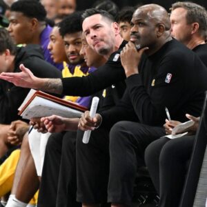 Los Angeles Lakers head coach JJ Redick reacts to a play against the Golden State Warriors in the third quarter during a preseason game at T-Mobile Arena.