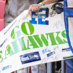 A Seattle Seahawks fans reacts to his team entering the field before the game against the Atlanta Falcons at Mercedes-Benz Stadium.