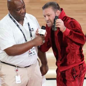 Irish mixed martial artist Conor McGregor (right) during the second half in game four of the 2023 NBA Finals between the Miami Heat and the Denver Nuggets at Kaseya Center.