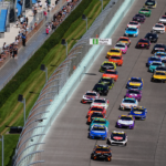 NASCAR Cup Series driver Christopher Bell (20) and NASCAR Cup Series driver Tyler Reddick (45) race ahead of NASCAR Cup Series driver Kyle Larson (5) during the Straight Talk Wireless 400 at Homestead-Miami Speedway.