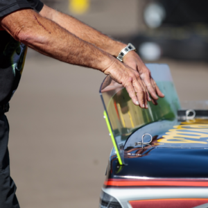 Detailed view of the rear spoiler wing on the car of NASCAR Cup Series driver Martin Truex Jr during practice for the Bluegreen Vacations 500 at ISM Raceway.