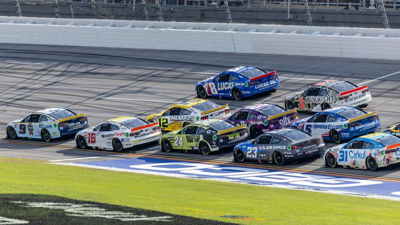Oct 6, 2024; Talladega, Alabama, USA; Ryan Blaney (12) and Ross Chastain (1) are part of the lead pack seconds before their wreck in the final laps during the second stage of the YellaWood 500 at Talladega Superspeedway. Mandatory Credit: Vasha Hunt-Imagn Images