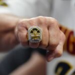 Denver Nuggets fan Gregg Sumey shows off his championship ring during the second half against the Orlando Magic at Ball Arena.