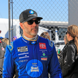 Two-time Daytona 500 Champion Jimmie Johnson walks through the garages to attend the drivers meeting before the Daytona 500, Monday, Feb. 19, 2024 at Daytona International Speedway.