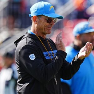 Los Angeles Chargers head coach Jim Harbaugh looks on before the game against the Denver Broncos at Empower Field at Mile High.