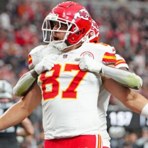 Oct 27, 2024; Paradise, Nevada, USA; Kansas City Chiefs tight end Travis Kelce (87) celebrates with wide receiver DeAndre Hopkins (8) after scoring a touchdown against the Las Vegas Raiders during the second quarter at Allegiant Stadium.