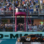 NASCAR Cup Series driver Tyler Reddick (45) crosses the start/finish line to win the Straight Talk Wireless 400 at Homestead-Miami Speedway.