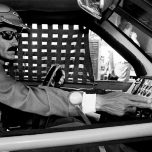 Driver Richard Petty checks the controls during qualifying trials for the Nashville Pepsi 420 NASCAR Grand National race at Nashville International Raceway on July 13, 1984. Petty will start in the third spot for the race.
