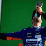 Daniel Ricciardo performing a shoey at the 2021 Italian GP