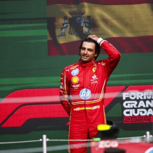 Carlos Sainz (Ferrari) celebrating on the podium after his Mexico City GP win