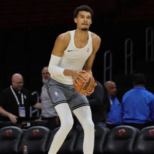 San Antonio Spurs center Victor Wembanyama (1) shoots the ball before the game against the Miami Heat at Kaseya Center.