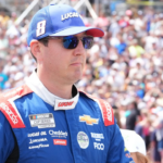 Kyle Busch walks to his car during Sunday's pre-race for the NASCAR Cup Series FireKeepers Casino 400 at Michigan International Speedway.