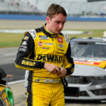 NASCAR Cup Series driver Christopher Bell (20) exits the car after a red flag for rain during the Ally 400 at Nashville Superspeedway.