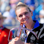Simona Halep (ROU) poses with the National Bank Open trophy after defeating Beatriz Haddad Maia (not pictured) in the women's final of the National Bank Open at Sobeys Stadium.