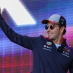 AUSTIN, TX - OCTOBER 19: Oracle Red Bull Racing driver Sergio Perez (11) of Mexico waives to fans as he leaves the Fan Forum before the Sprint Race of the Formula 1 Pirelli United States Grand Prix on October 19, 2024, at Circuit of The Americas in Austin, Texas.