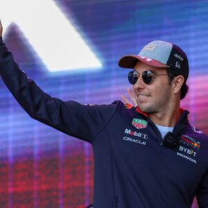 AUSTIN, TX - OCTOBER 19: Oracle Red Bull Racing driver Sergio Perez (11) of Mexico waives to fans as he leaves the Fan Forum before the Sprint Race of the Formula 1 Pirelli United States Grand Prix on October 19, 2024, at Circuit of The Americas in Austin, Texas.