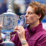 Jannik Sinner (ITA) celebrates with the trophy after defeating Taylor Fritz (USA) in the men’s singles final of the 2024 US Open