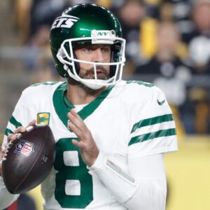 New York Jets quarterback Aaron Rodgers (8) looks to pass against the Pittsburgh Steelers during the first quarter at Acrisure Stadium.