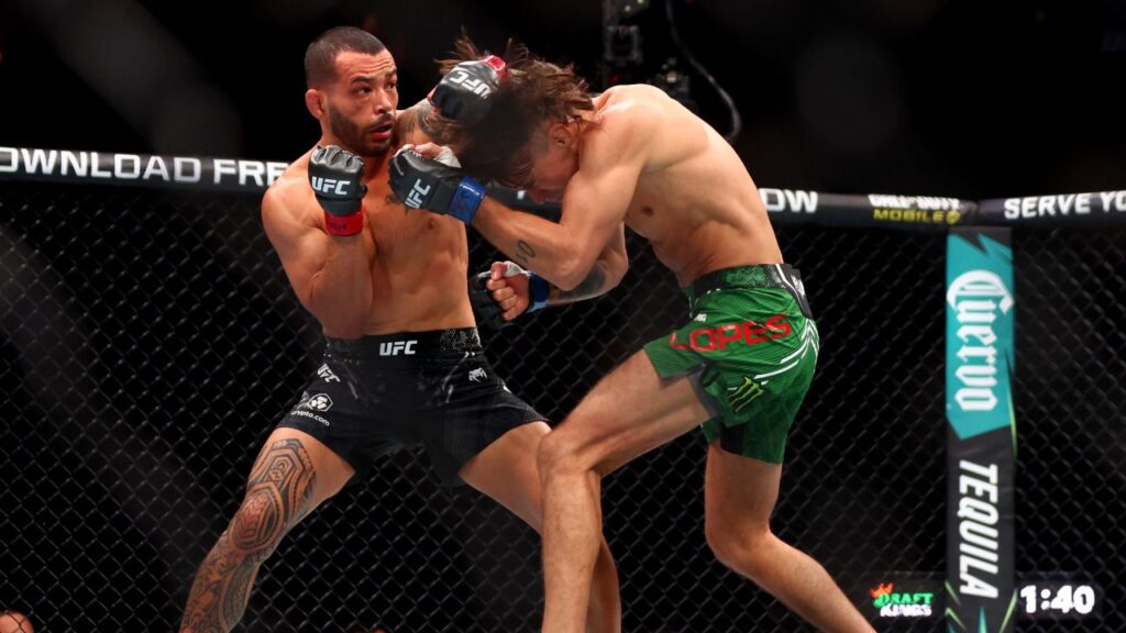 Dan Ige (red gloves) fights Diego Lopes (blue gloves) during UFC 303 at T-Mobile Arena. Mandatory