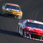 Monster Energy NASCAR Cup Series driver Austin Dillon (3) leads Monster Energy NASCAR Cup Series driver Daniel Hemric (8) out of turn three during the Quaker State 400 by Walmart at Kentucky Speedway.